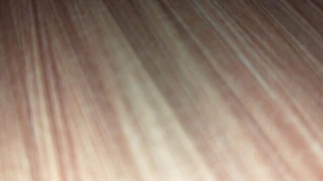 Close up abstract background of smooth wooden texture with natural grain patterns