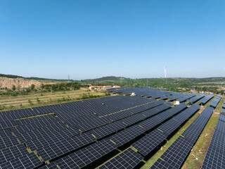 photovoltaic solar panel array under blue sky