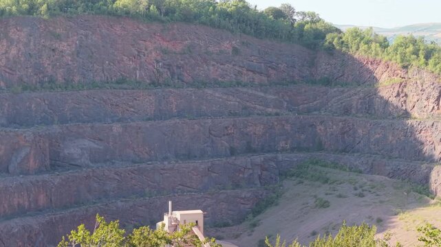 CARDIFF, WALES - JULY 31, 2026: Aerial drone footage of Taff's Well Quarry on the day after an explosion caused devastating flooding and mudslides in the nearby village of Gwaelod-y-Garth.
