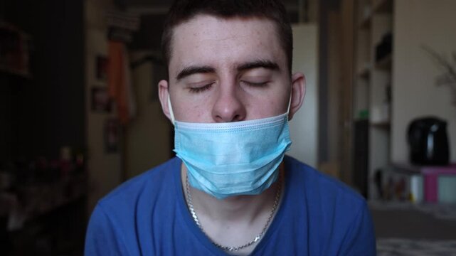 Man Wearing Protective Face Mask Incorrectly