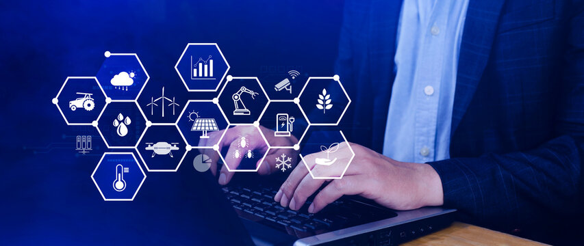 Smart agriculture and agritech concept. Hand using touching digital icons interface of modern farming technology, Agribusiness innovation and smart farming management. not ai