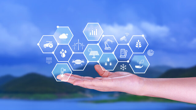 Smart agriculture and agritech concept. Hand using touching digital icons interface of modern farming technology, Agribusiness innovation and smart farming management. not ai