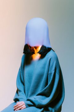 Surreal portrait of a woman with a glowing facial void instead of a face for concepts of digital anonymity, mental health, and identity