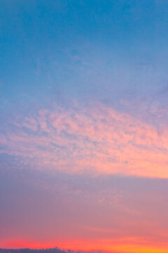 sky at sunset for background. red clouds on the blue sky. nature backdrop in evening light