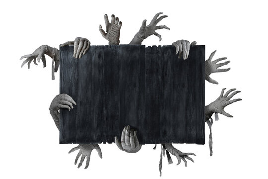 Mummy's hands wrapped in a bandage on copy space wooden background. The hand of the risen dead mummy monster for Halloween horror concept.