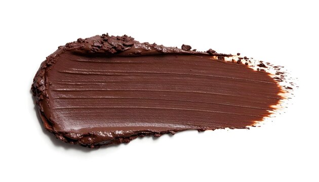Textured dark brown makeup smear with fine particles on a white background
