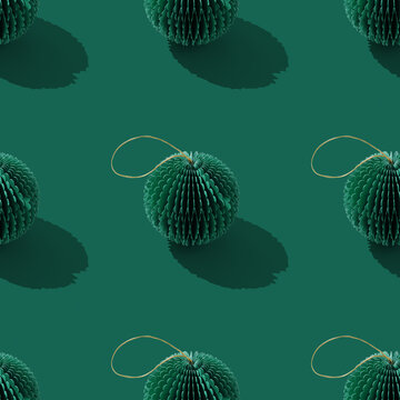 Festive Holiday Packaging Design with green Paper Christmas Ornaments as round balls, eco-friendly New Year decoration. Minimal aesthetic holidays Seamless pattern, Print design and gift wrap pattern.