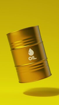 Single gold metal oil barrel rotating on a yellow background for petroleum industry concept. Vertical video.