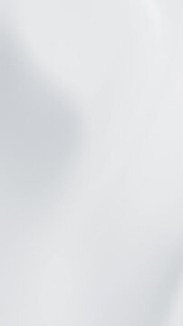 Abstract reflective ripples and milky liquid waves flowing across a white satin-like surface, 3D render seamless Vertical video.