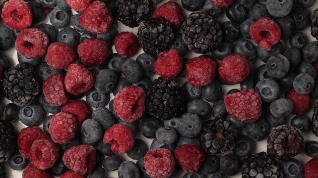 Frozen mixed berries dolly shot from above