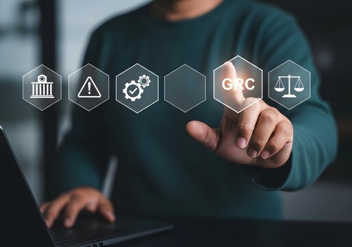 Business professional using digital interface for grc governance risk and compliance strategy