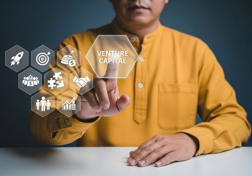 Businessman touching a digital screen interface with venture capital investment icons display