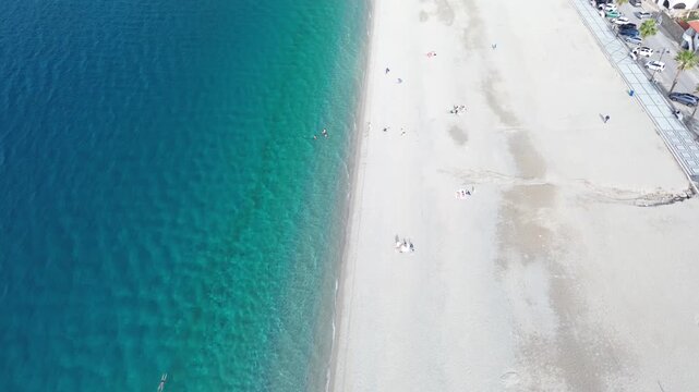 Scilla, Marina Grande Beach, Ruffo Castle, Castello Ruffo di Scilla, Calabria, Italy, Tyrrhenian Sea, Costa Viola, drone footage, aerial footage, aerial reveal, top down view, gimbal tilt, aerial view