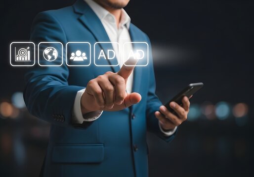 Businessman using mobile phone to interact with digital advertising and marketing icons menu