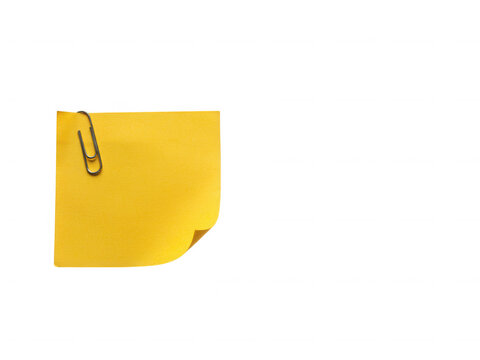 Single yellow sticky note with metallic paperclip attached isolated on transparent background for quick reminders