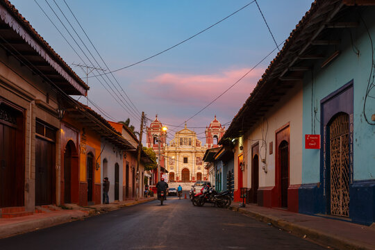 Street scene in the city of Leon near the market with the cathedral at the very end