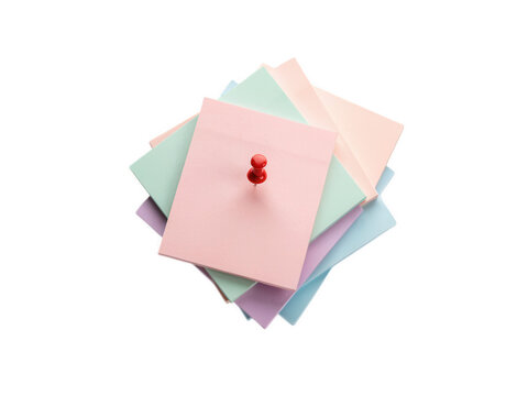 Towering stack of assorted pastel sticky notes pinned with a sharp red push pin isolated on transparent background