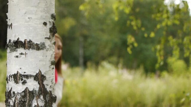 beautiful woman near birch