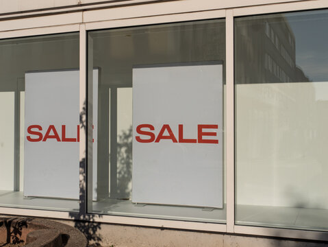 Sale Signage Displayed in Retail Window