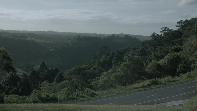 Ute Driving Along Road in Lush Sunshine Coast Hinterland Queensland