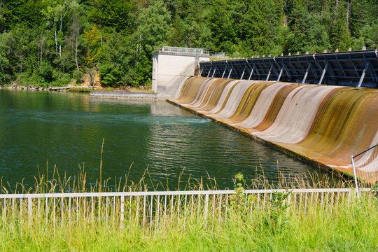 Scenic Hydroelectric Dam Spillway and Reservoir in Bavaria Germany