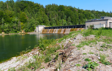 Fototapeta premium Hydroelectric Power Station with Water Overflowing in Bavaria Germany
