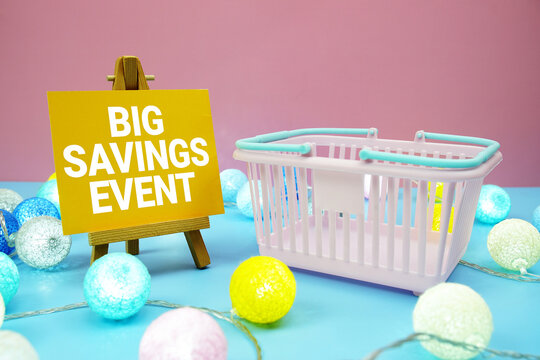 Big Savings Event text with shopping basket on blue background