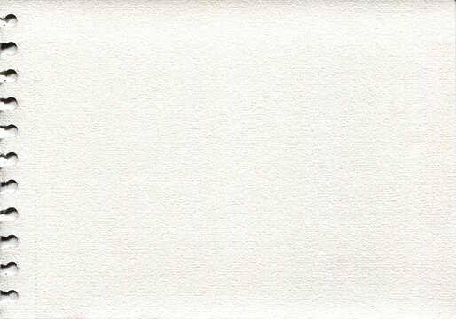 Empty sketchbook page texture with ring bound holes on left margin, off-white watercolor paper background for design mock up