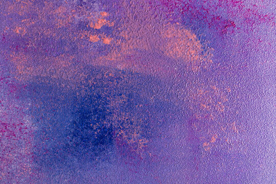 Abstract purple and blue textured background with orange accents