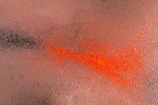 Abstract autumn texture with bright orange and black pattern