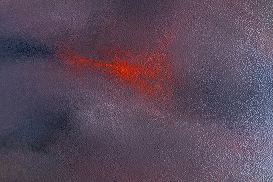 Abstract autumn texture with bright red accent and dark pattern