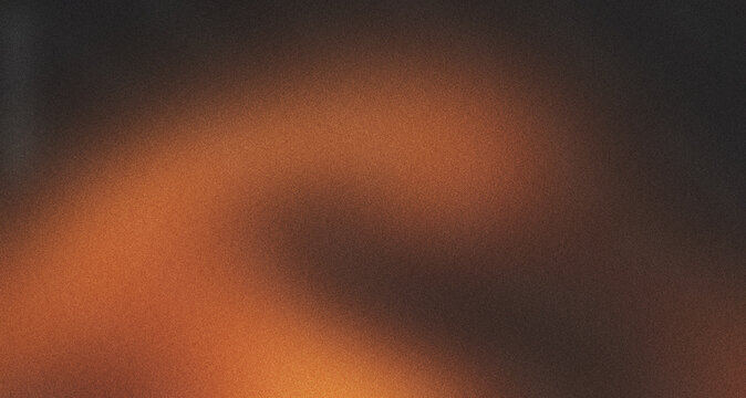 Abstract grainy background with warm amber light and dark shadows featuring heavy film noise texture and soft blurred motion for cinematic projects.