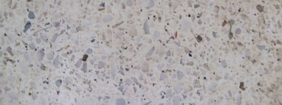 Terrazzo stone texture background, polished marble chips in concrete floor, neutral beige granite surface for interior design and architectural backdrop