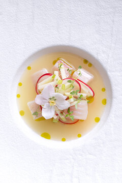 Peruvian fish ceviche with radish and edible flower