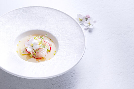 Peruvian fish ceviche with radish and edible flower
