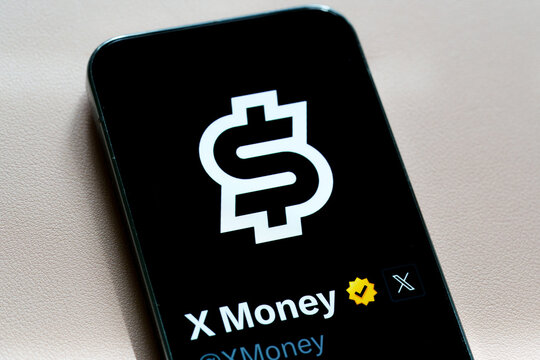 X Money logo and verified account displayed on a smartphone screen in a digital payments concept for the X platform. Stafford, United Kingdom, August 2, 2026.