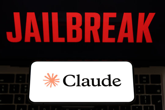 Claude app logo displayed on a smartphone in front of a red JAILBREAK warning in an artificial intelligence safety concept. Stafford, United Kingdom, August 2, 2026.