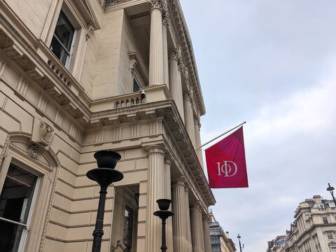 Stately neoclassical architecture of the Institute of Directors at 116 Pall Mall in central London