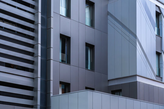 Modern building facade detail with sleek metal panels