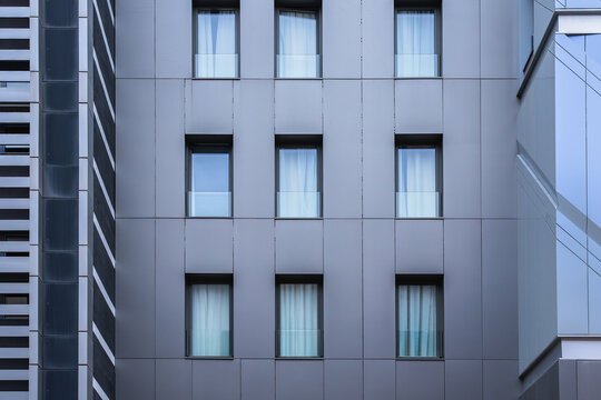 Modern building facade detail with window grid pattern