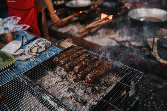 Traditional Lao grilled sausage at a Laos street food market