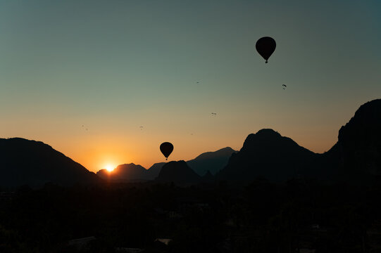 Sunrise hot air balloon flight over Vang Vieng, Laos