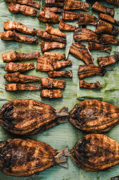 Smoked fish display on banana leaf in Luang Prabang, Laos