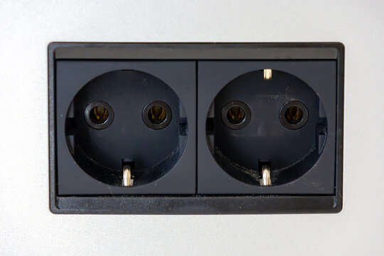 Double electrical socket inside wall room interior