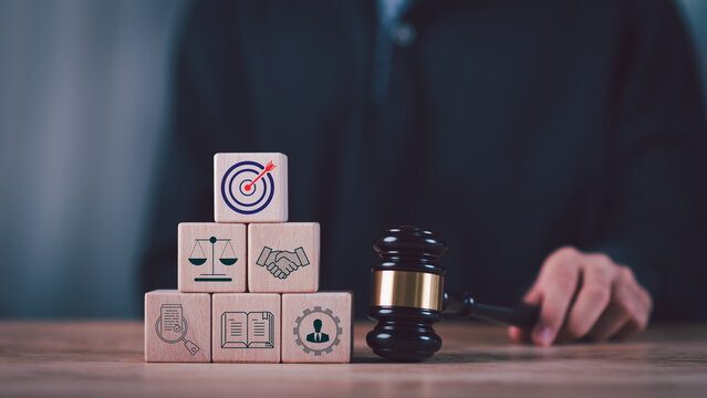 Corporate lawyer demonstrates legal compliance, corporate governance, contract management, justice principles, business ethics, regulatory oversight, risk management, and strategic decision making.
