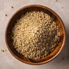 Obraz premium Overhead view of a wooden bowl filled with sprouted millet grains, healthy food and nutrition concept, this organic ingredient is a plant-based source of fiber and protein