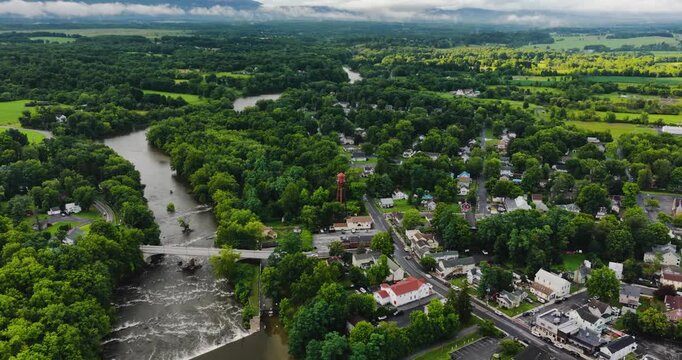 Shawangunk, NY, USA - July 29, 2026. Aerial video of the Hamlet of Wallkill in the Town of Shawangunk NY, Ulster County, on a partly cloudy summer afternoon.	