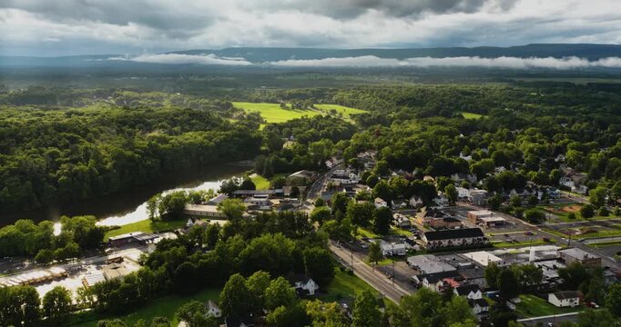 Shawangunk, NY, USA - July 29, 2026. Aerial video of the Hamlet of Wallkill in the Town of Shawangunk NY, Ulster County, on a partly cloudy summer afternoon.	