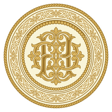 Decorative gold monogram seal with scrollwork.