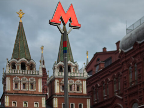 Moscow Metro Sign in Front of Historical Buildings